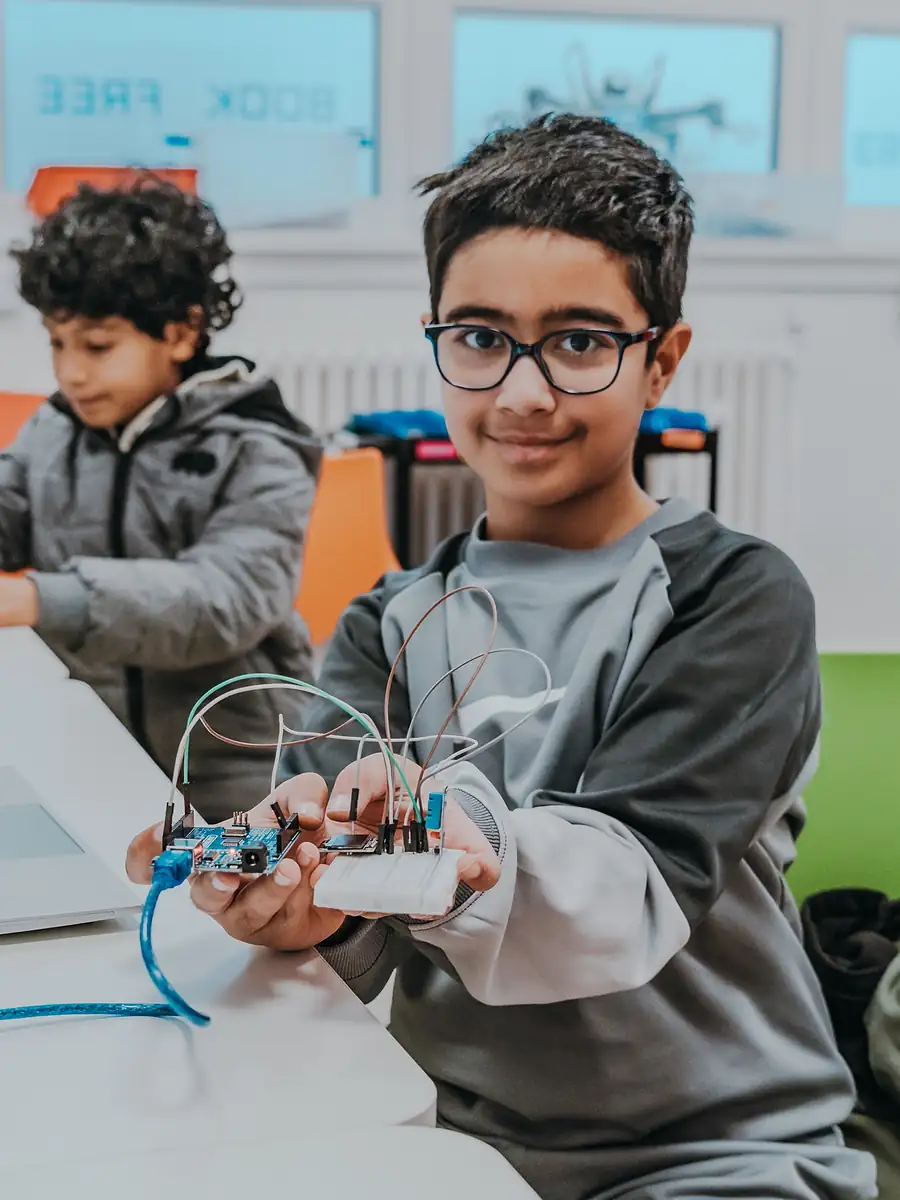 A student working on an Arduino project
