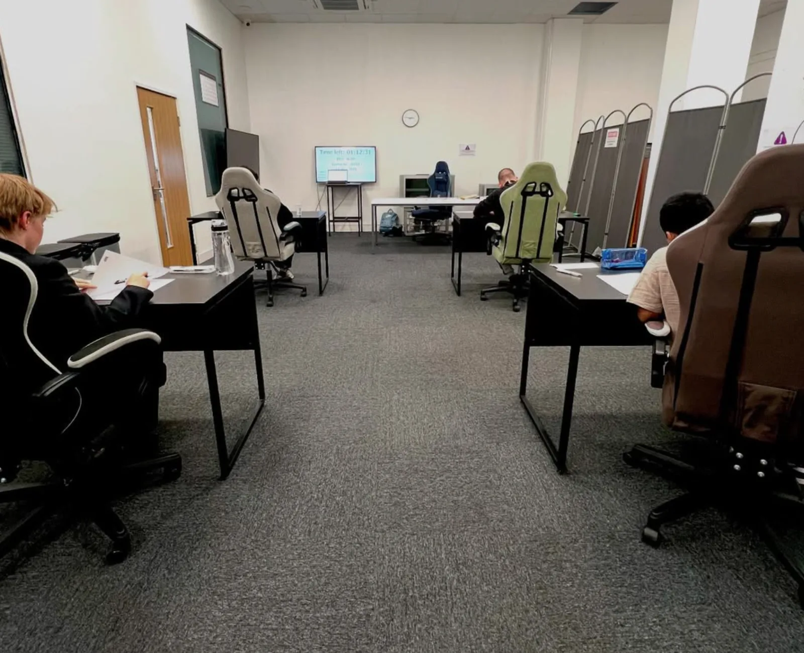 Luminary Tech Path candidates sitting a GCSE paper in the exam room